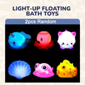 Light-up bath toy set with glittering floating sea animals