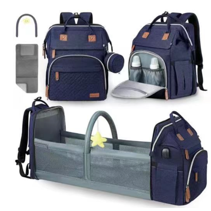 Foldable changing backpack with travel cot