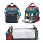 Foldable changing backpack with travel cot