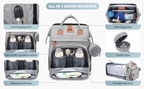Foldable changing backpack with travel cot