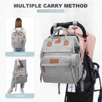Foldable changing backpack with travel cot