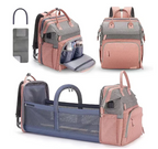 Foldable changing backpack with travel cot