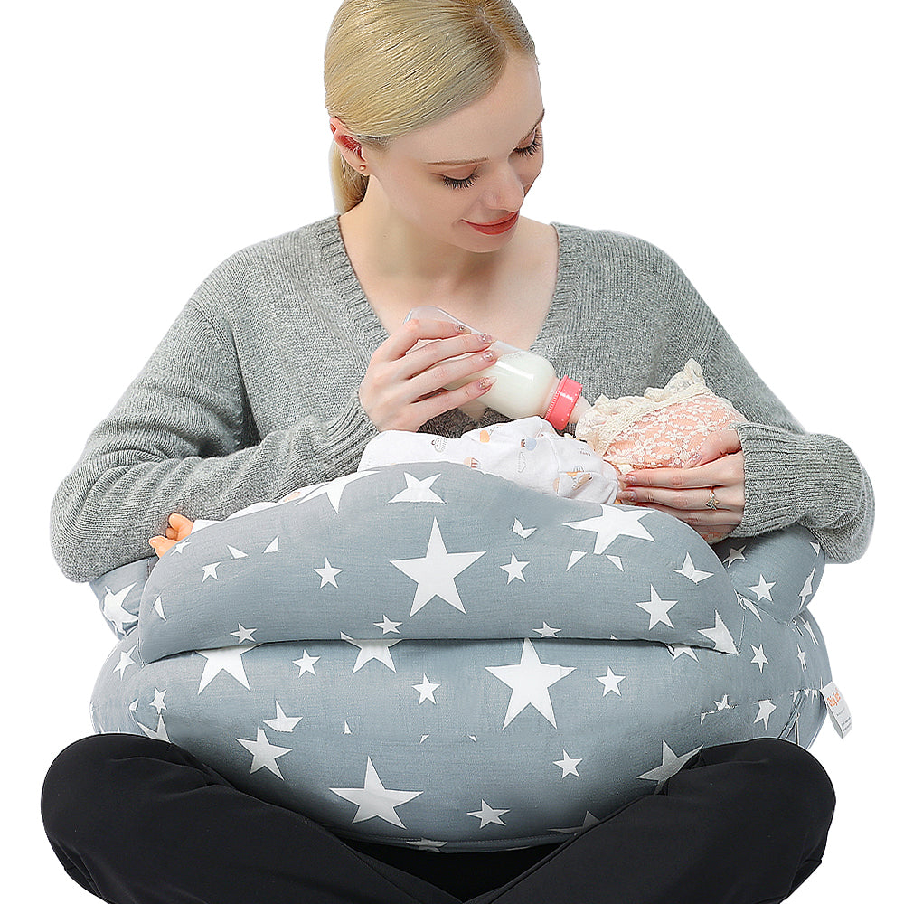 Adjustable nursing pillow with safety fence