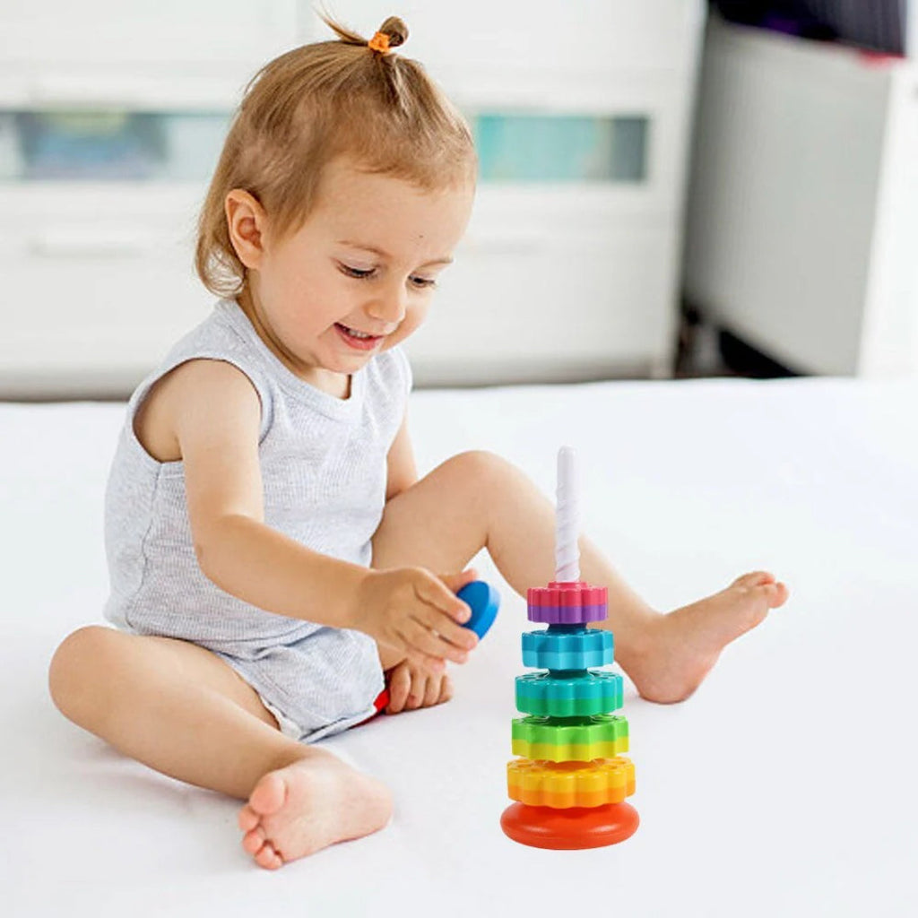 Rotating stacking tower with colorful building blocks