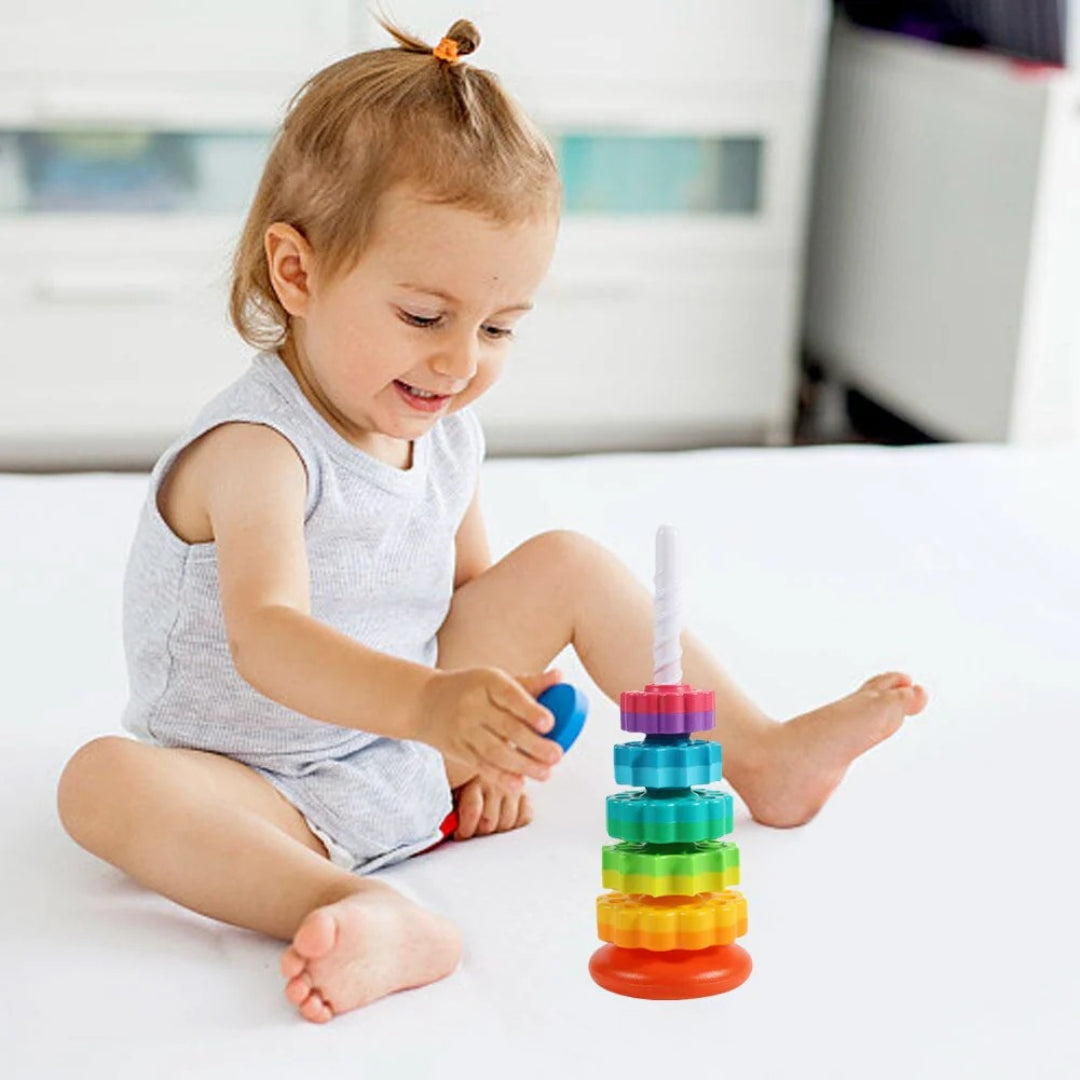 Rotating stacking tower with colorful building blocks