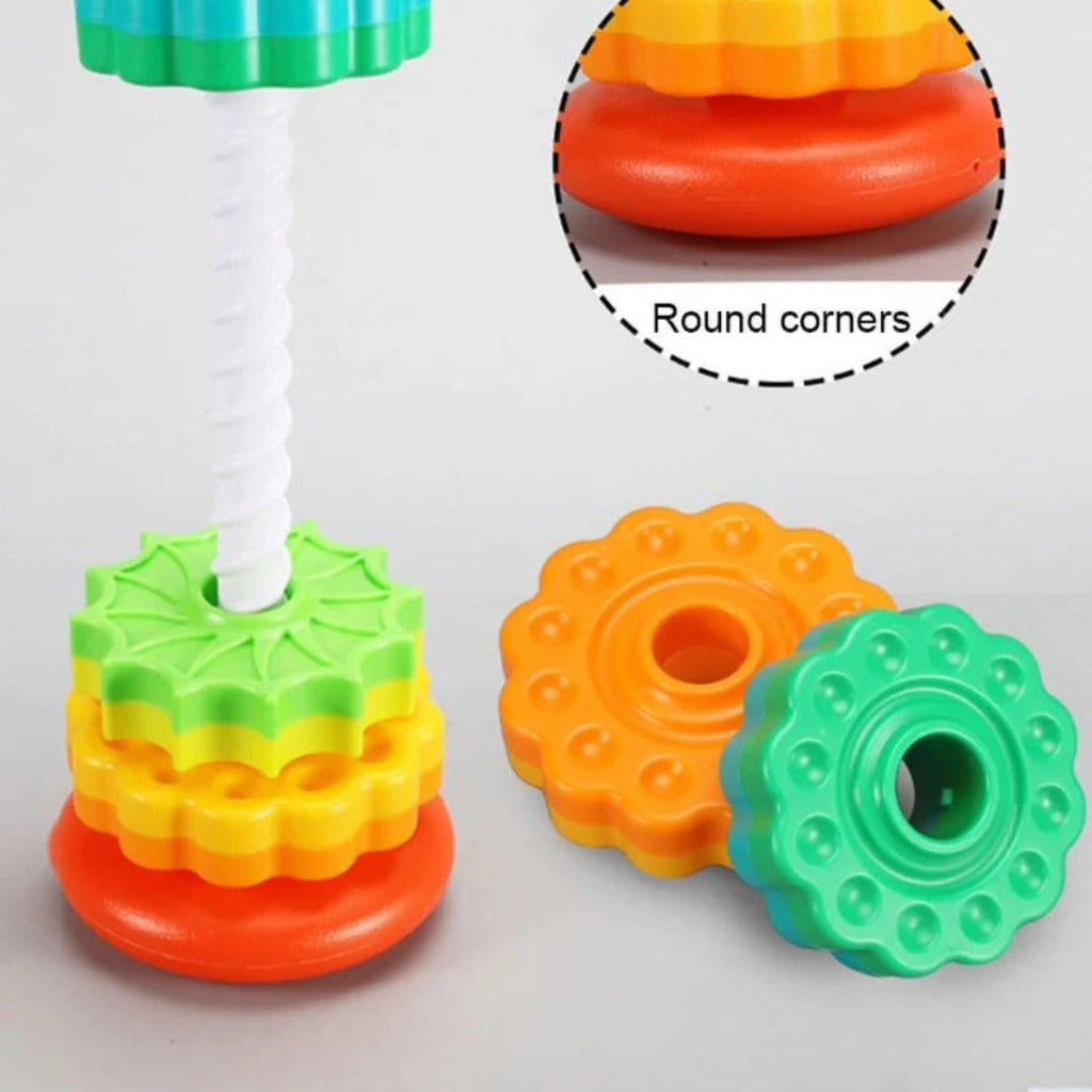 Rotating stacking tower with colorful building blocks