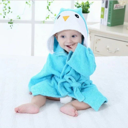 Baby bathrobe in soft absorbent material with animal motif