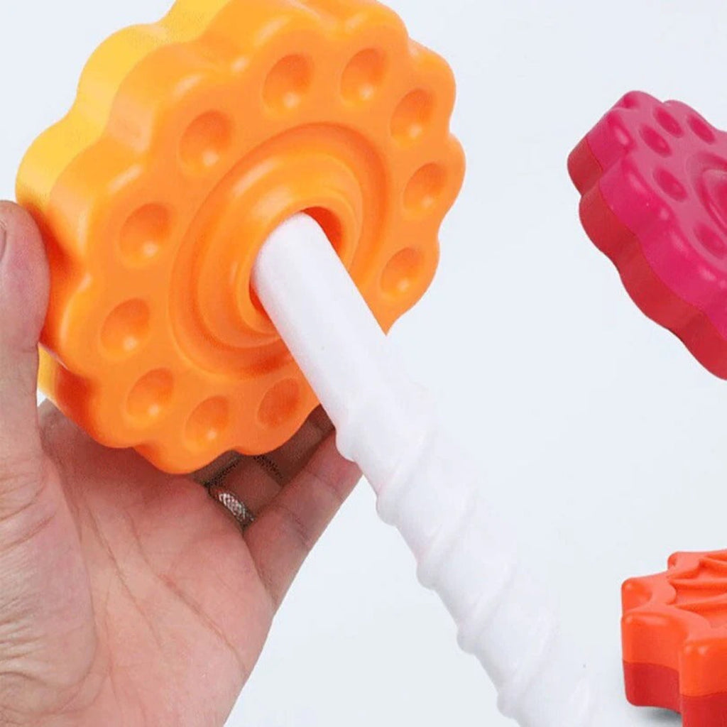 Rotating stacking tower with colorful building blocks