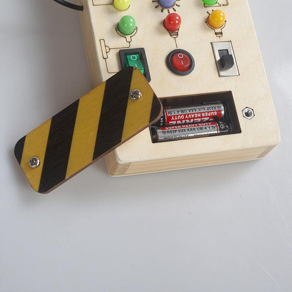 Wooden activity board sensory panel with switches and buttons
