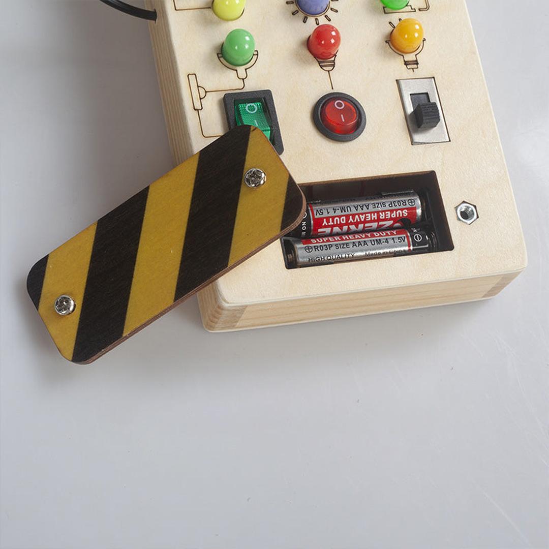 Wooden activity board sensory panel with switches and buttons