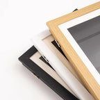 Frame for children's drawings with storage opening