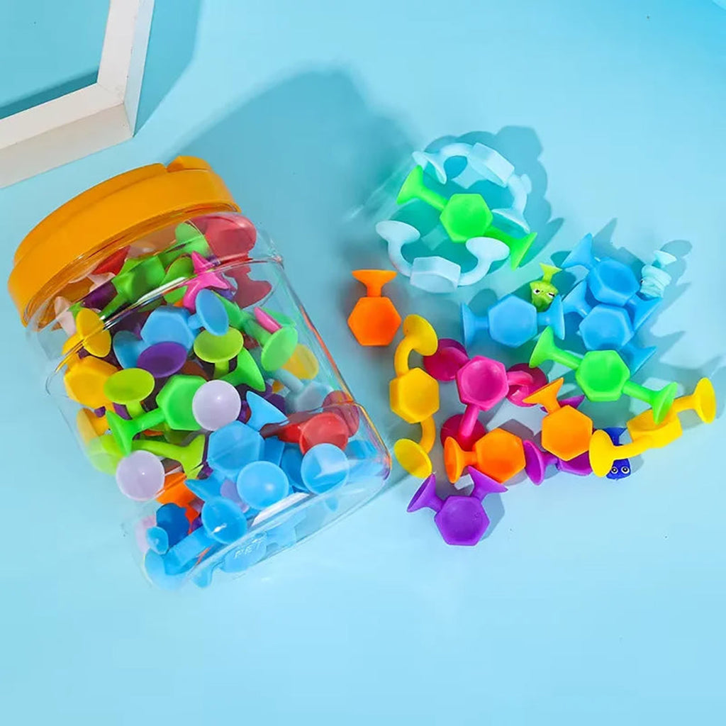 Suction cup toy for children with colorful fasteners