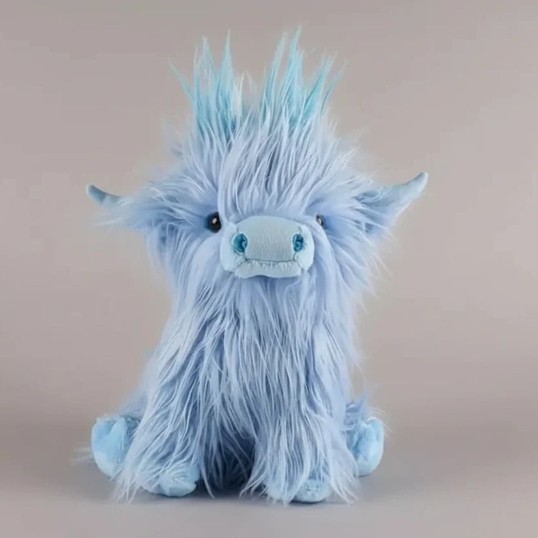 Blød Highland ko bamse i krammevenligt plys