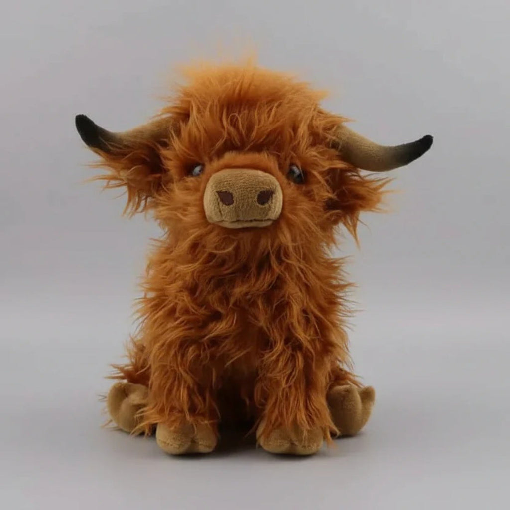 Blød Highland ko bamse i krammevenligt plys