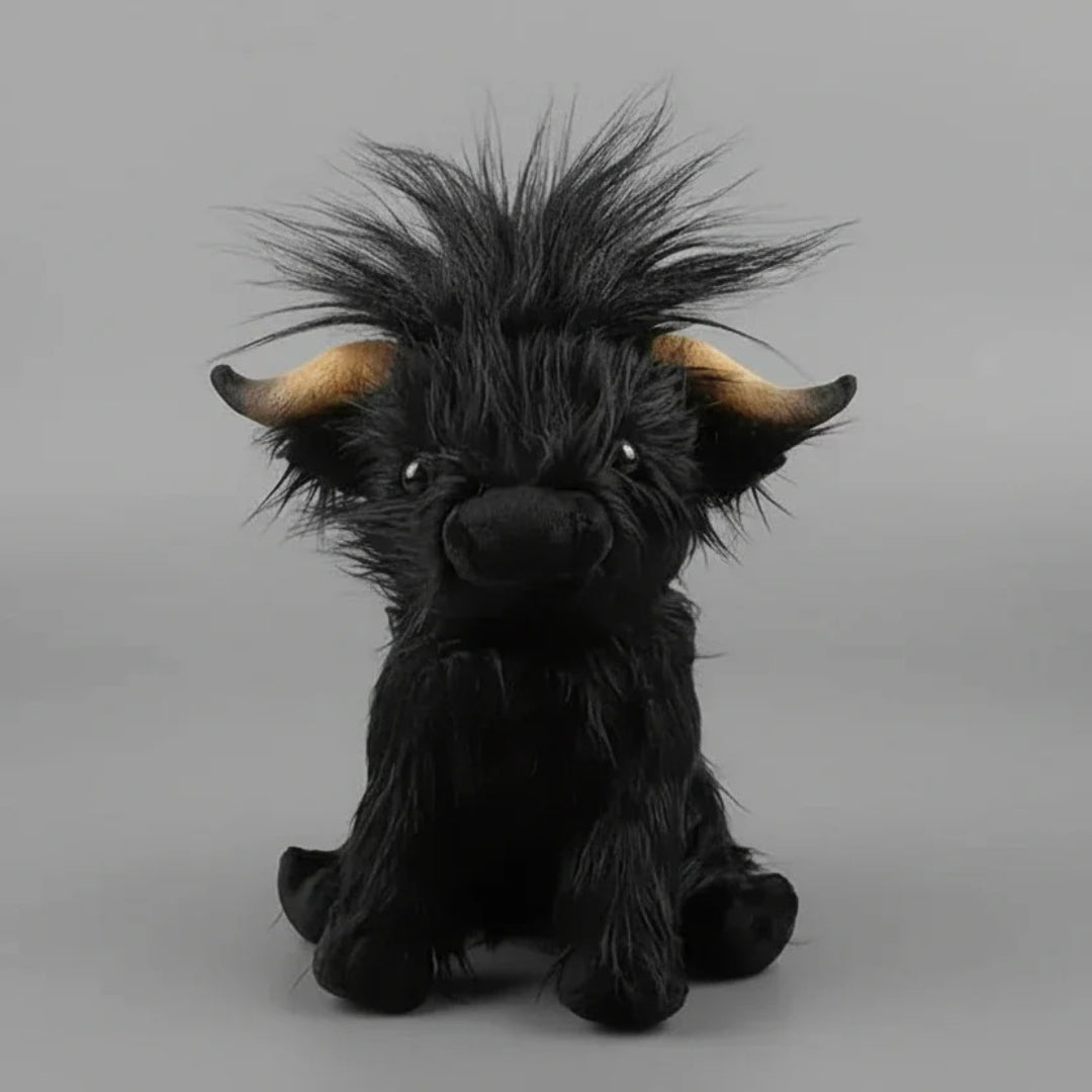 Blød Highland ko bamse i krammevenligt plys