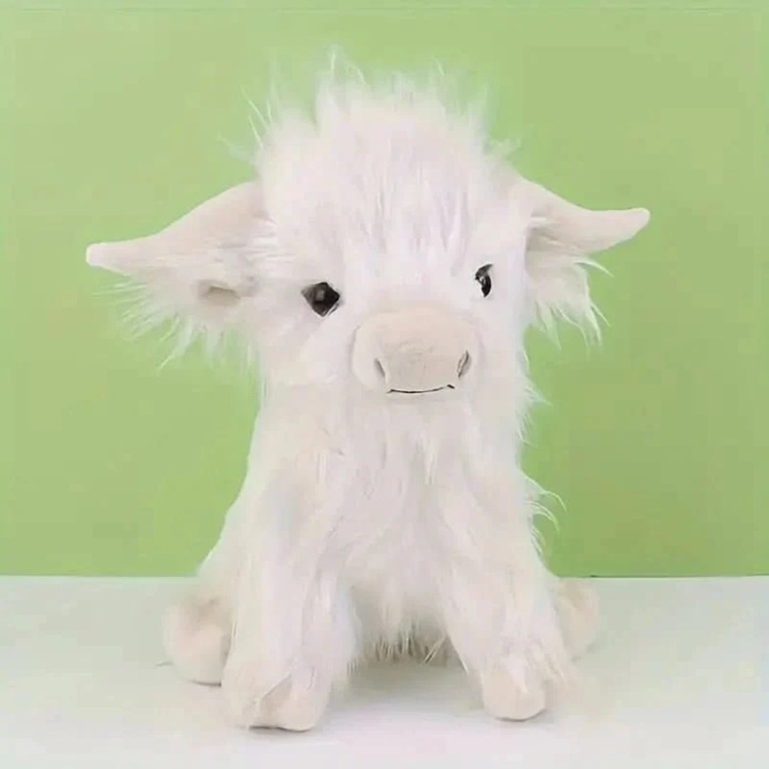 Blød Highland ko bamse i krammevenligt plys