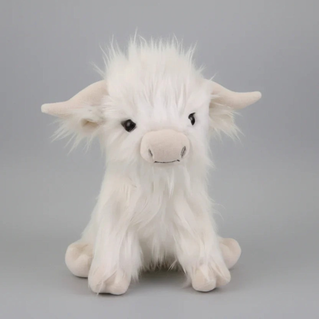 Blød Highland ko bamse i krammevenligt plys