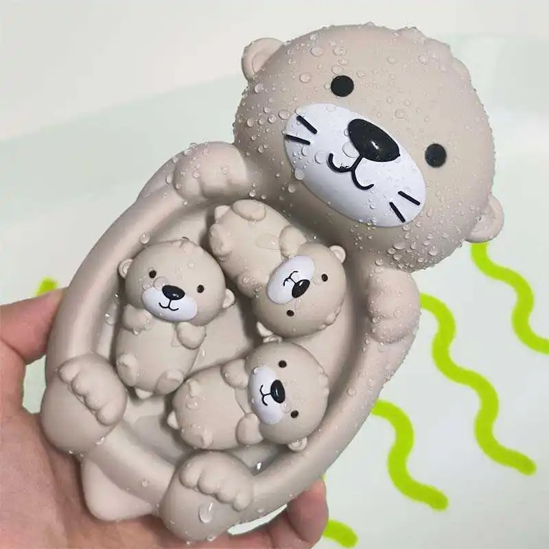 Floating, soft water toys that spray