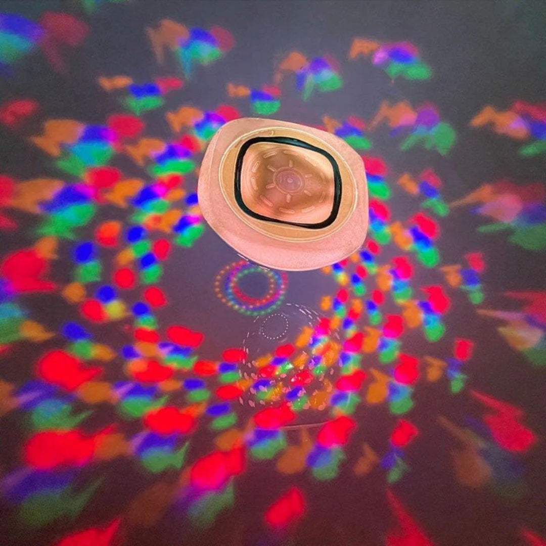 LED bath toy with fountain and spray effect