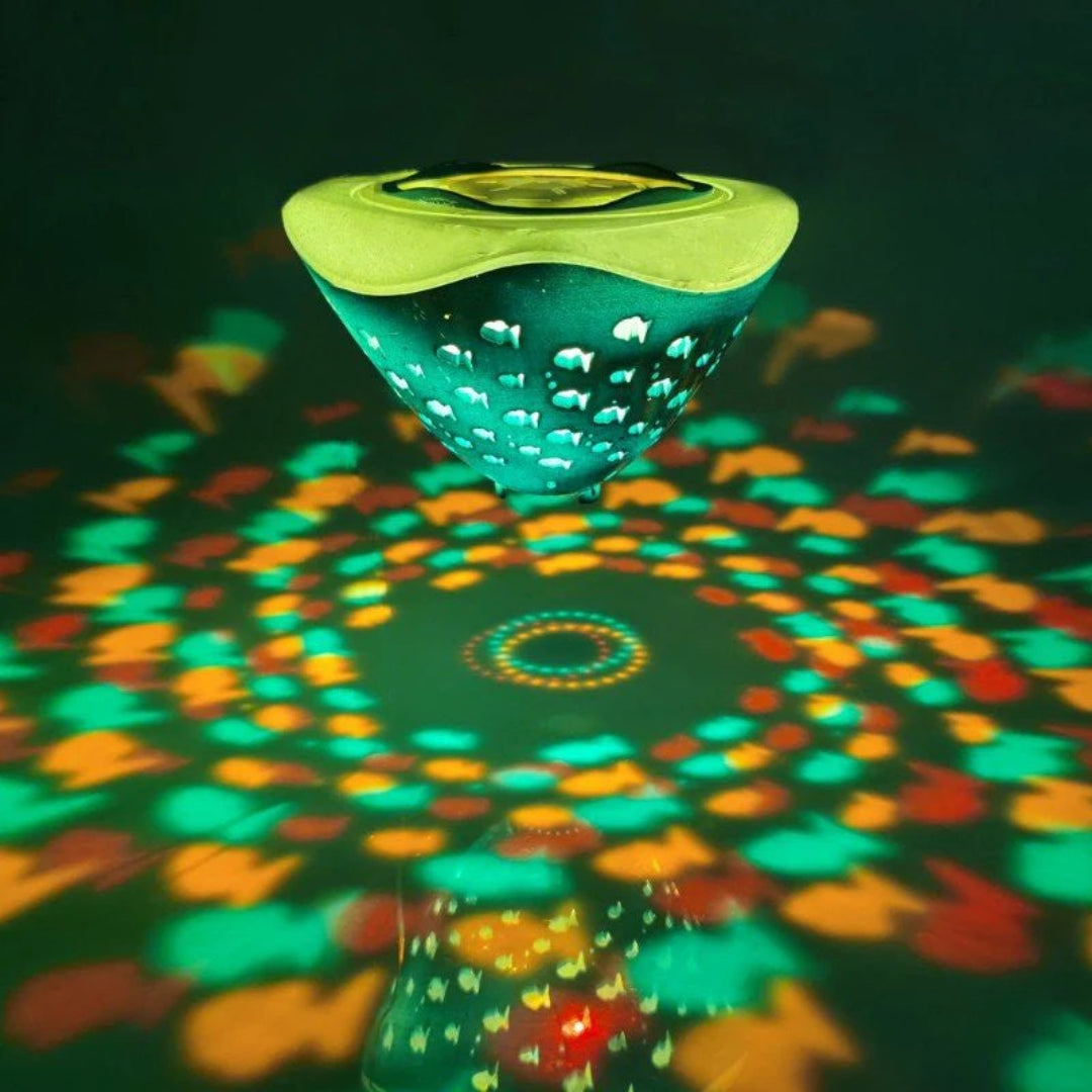 LED bath toy with fountain and spray effect