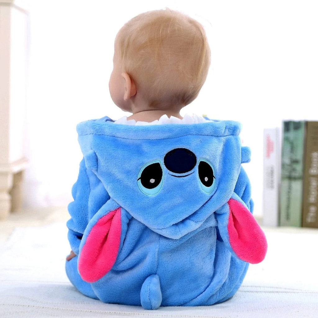 Baby fleece jumpsuit with hood and cartoon motif