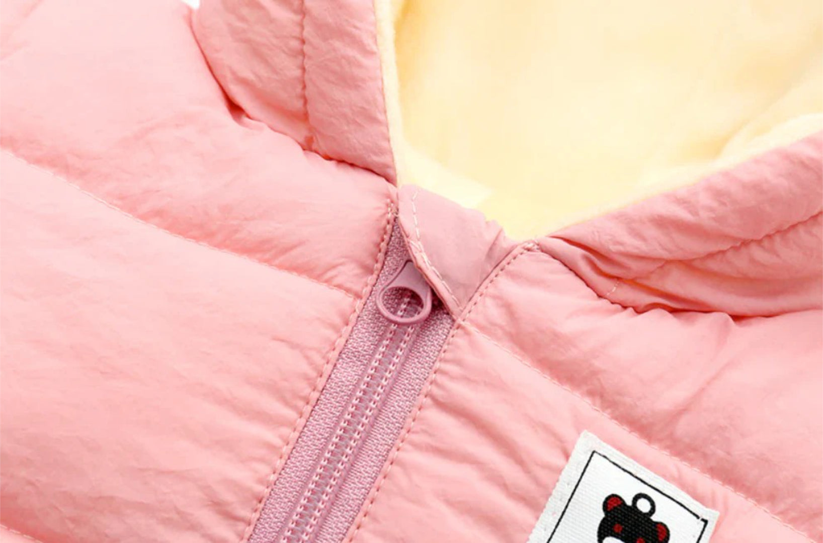 Ski overall for babies insulated with fleece and a hat