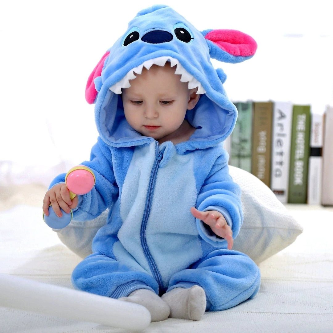 Baby fleece jumpsuit with hood and cartoon motif