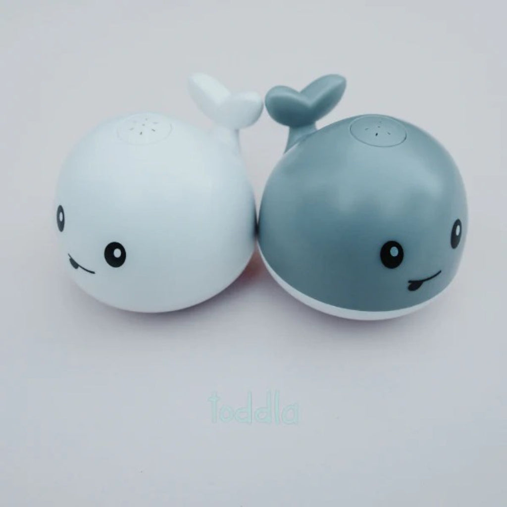 Whale bath toy with spray function