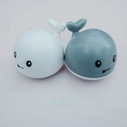 Whale bath toy with spray function