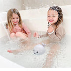 Whale bath toy with spray function