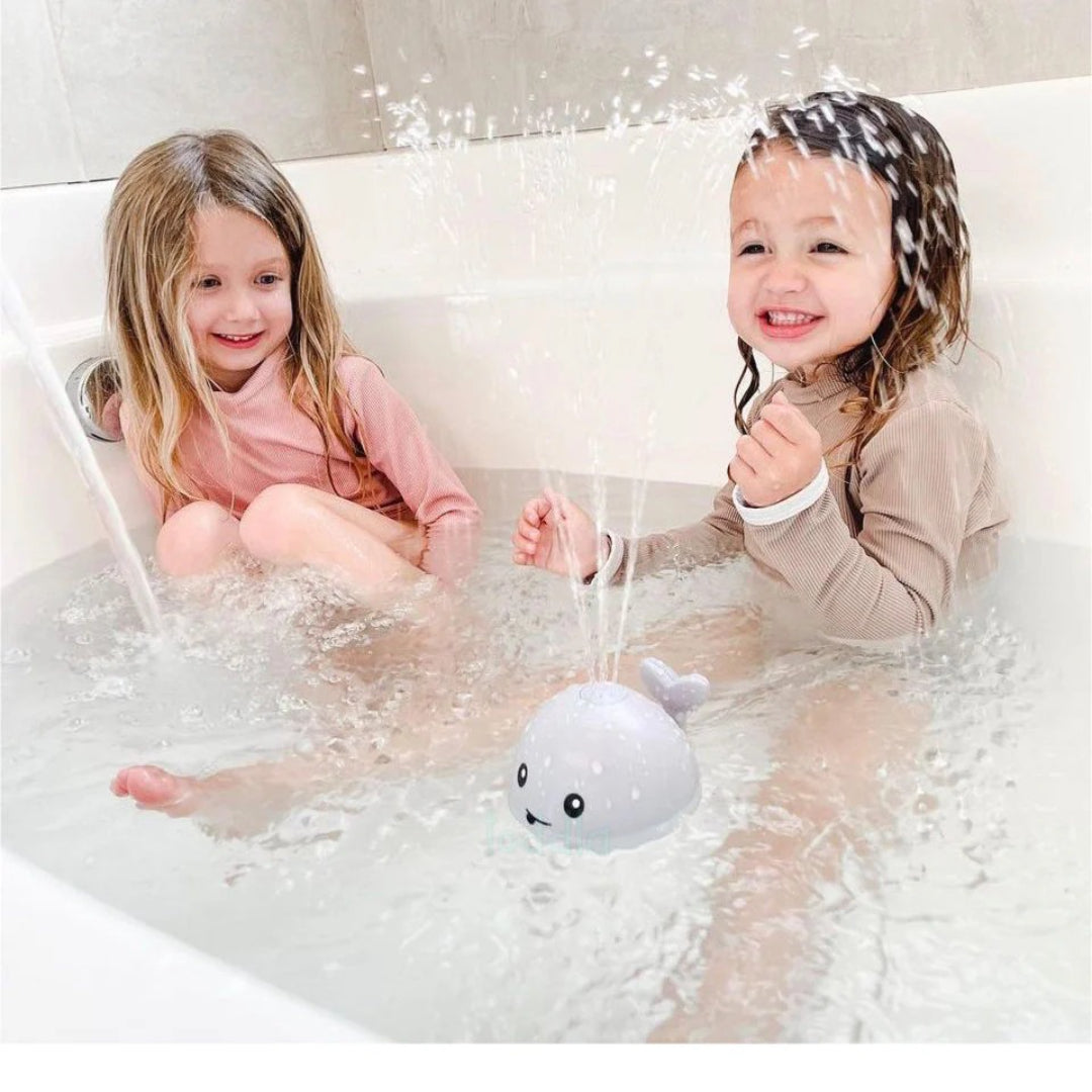 Whale bath toy with spray function