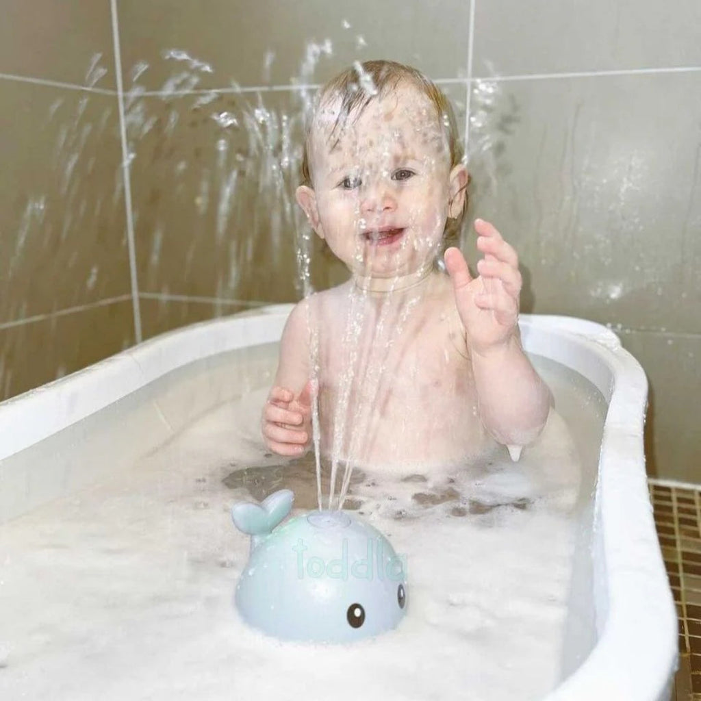 Whale bath toy with spray function
