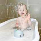 Whale bath toy with spray function