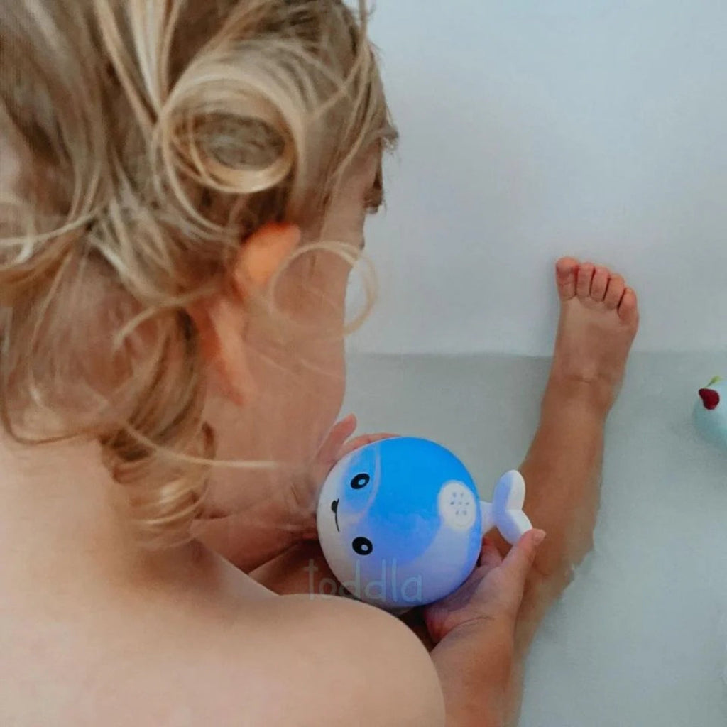 Whale bath toy with spray function