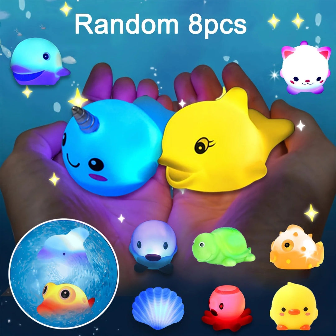 Light-up bath toy set with glittering floating sea animals