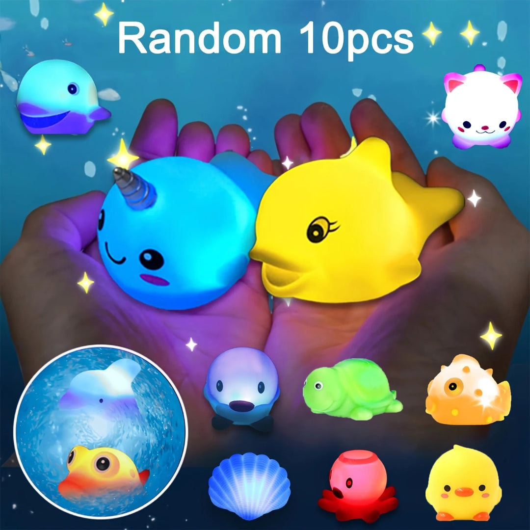 Light-up bath toy set with glittering floating sea animals