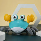 Crawling toy with music and automatic obstacle avoidance sensor