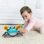 Crawling toy with music and automatic obstacle avoidance sensor
