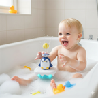 Penguin bath toy with squirting water